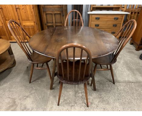 Five Ercol Windsor dining chairs and a drop-leaf table