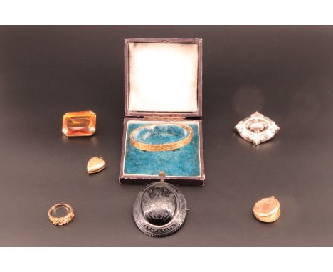 A group of Victorian and later jewellery including a large Edwardian jet mourning brooch engraved "A Gascoigne, died July 26,