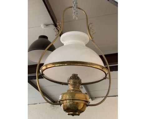 A late 19th / early 20th Century pendant brass oil lamp, with milk glass shade, approximately 70 cm total