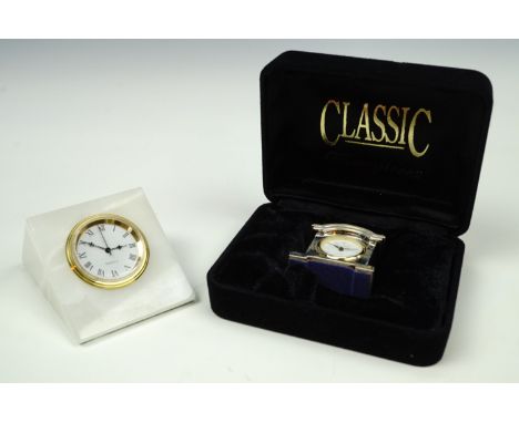 A new-old-stock William Widdop miniature quartz clock, together with a similar onyx clock, former 4 cm