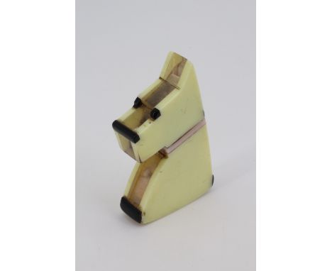 A vintage novelty Art Deco influenced Lucite cigarette lighter modelled as a Scottie dog, circa 1930s, 7.5 cm