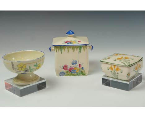 Three items of Art Deco ceramics, comprising Crown Fieldings tea caddy, a Royal Ridgways 'Rosamund' sugar bowl and a Royal Do