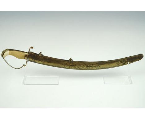 A Georgian naval dirk, its hilt comprising a checkered ivory grip with gilt brass back strap and lion's mask pommel, the re-c