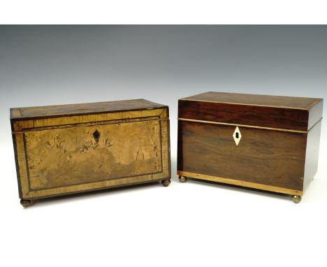  An early 19th century double compartment tea caddy of square form on bun feet, burr wood and sycamore veneered with brown oa