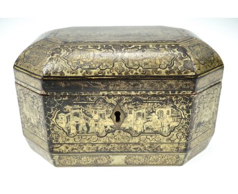 A 19th Century Chinese export gilt lacquered tea caddy containing two base metal tea canisters, 20 cm x 14 cm x 12 cm