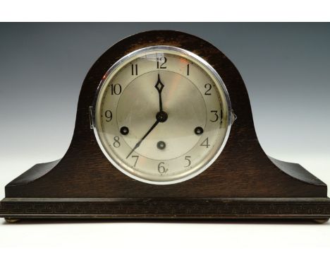 An oak Napoleon hat mantle clock with Mauthe movement, clock face 15 cm diameter