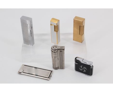 A Dunhill gilt pocket cigarette lighter together with moderne examples by Maruman of Japan and an Austrian Imco Triplex etc