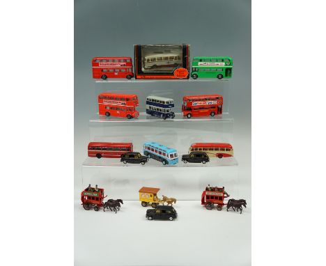 A Dinky Toys Routemaster bus together with Corgi Routemaster buses, taxis etc