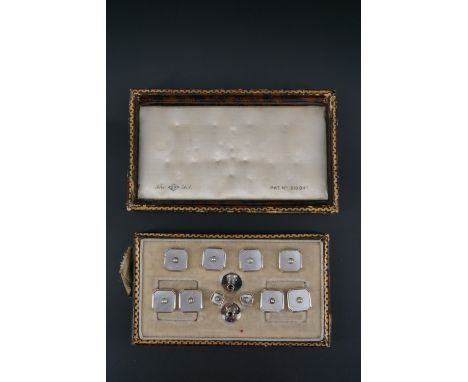A vintage cased set of Art Deco influenced cuff links and shirt studs in seed pearl, mother of pearl and white metal, circa 1