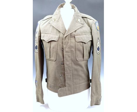 A USAAF IX Troop Carrier Command 9th Air Force "Ike" jacket, bearing unit patches, sergeant first class rank insignia, overse