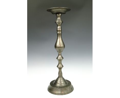 A large cast and turned brass pricket candlestick, 51.5 cm