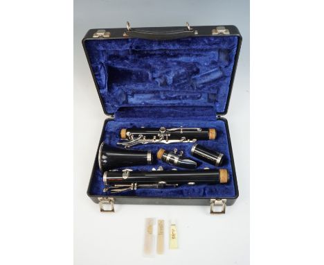 A Selmer Bundy Resonite clarinet, in transit case