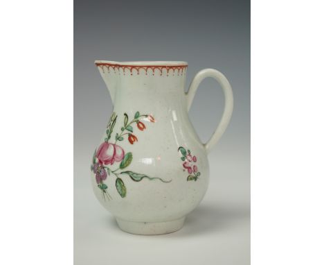 An 18th century baluster shaped sparrow beak cream jug, having polychrome enamel floral decoration, 9 cm