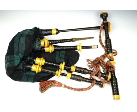 A set of 1950s British army issue great highland bagpipes, Ordnance broad arrow marked and dated