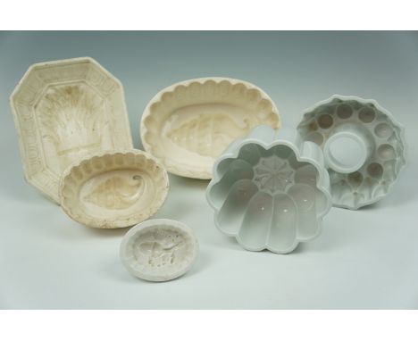 Six 19th century and later pottery jelly moulds, comprising two early 20th century Shelly moulds, a mould decorated with a wh