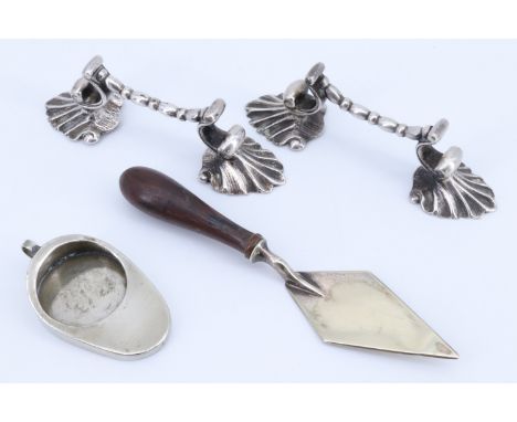 Victorian electroplate novelties comprising a trowel-form butter knife and a miniature slipper pan, together with a pair of k