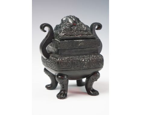 A Chinese black glazed porcelain koro, seal mark to base, 12 cm