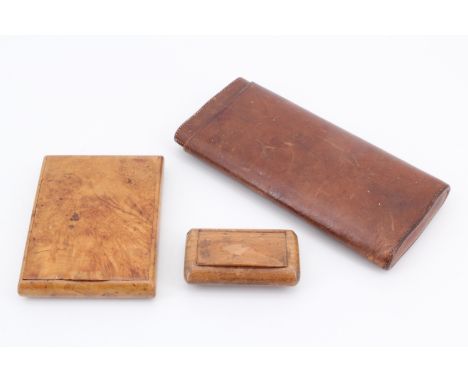 A Victorian stitched leather cigar case with a pen inscription to the inner half, an elm cigarette case with inset lid on a k