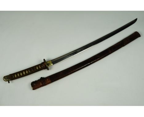 A Second World War Imperial Japanese army officer's shin gunto sword, the Seki school blade's tang marked  Tokushuko Motte Id