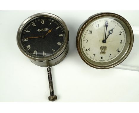 A Jaeger fascia clock together with another by Smiths of London, (running when catalogued, accuracy and reliability untested)
