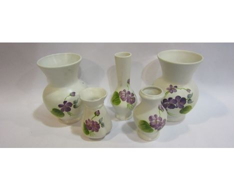 A set of five E. Radford 'Violet' vases  