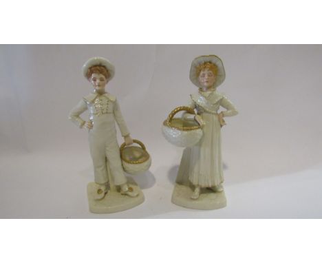 A pair of Victorian Worcester porcelain figures, boy and girl carrying baskets approx 21.5cm tall