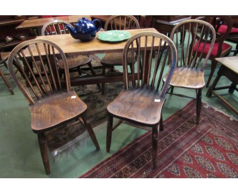 Five similar late 19th Century elm seated stick back chairs with V-support to backs and 'H' stretchers 