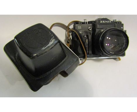 A vintage Russian 35mm camera, Zenith II with leather case, includes Helios Japanese F2M42 lens   