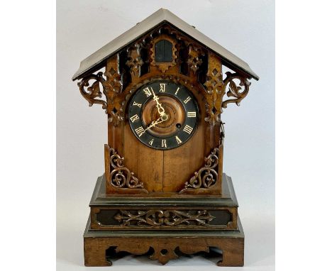 BLACK FOREST MANTEL CUCKOO CLOCK - gothic case, ebonised chaptering with applied Roman numerals, half hour chime strike, 54.5