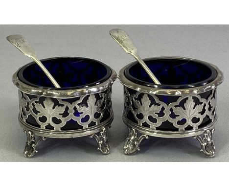 VICTORIAN SILVER TABLE SALTS, A PAIR - along with two non-matching spoons, Sheffield 1845, Henry Wilkinson & Co, and Exeter 1