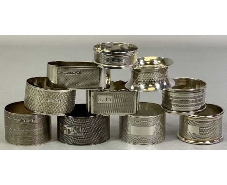 TEN BIRMINGHAM SILVER NAPKIN RINGS - all having engine turned decorations, various dates and maker's marks, 6.8ozt gross