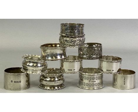 TEN HALLMARKED SILVER NAPKIN RINGS - five bearing Sheffield hallmarks including a matching pair, 1918, maker Henry Wigfull; c