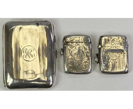 BIRMINGHAM SILVER CIGARETTE CASE &amp; TWO VESTA CASES - the cigarette case having shallow ribbed decoration and monogrammed 