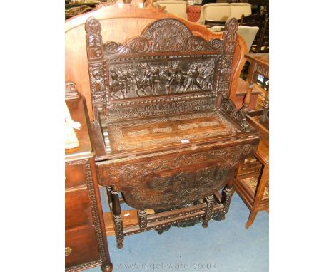 An interesting 19th c. Oak Side Table, the upstand back having well-carved battle scenes (possibly the North War), in carved 