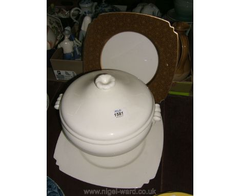 A large white Soup Tureen with ladle and two large Villeroy and Boch Plates
