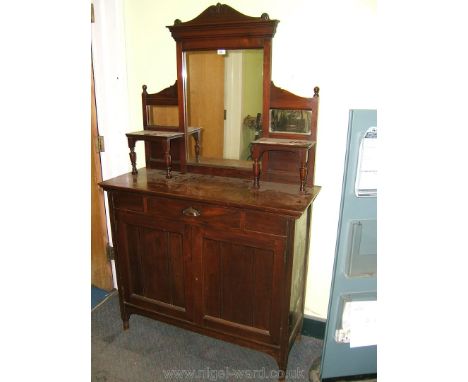 An Edwardian Mahogany Chiffonier, having triple mirrorback with two small shelves on urn turned supports, the base having sho