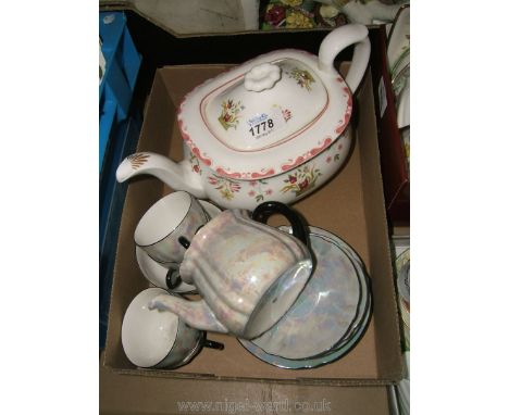 A Wedgwood 'Bianca' Teapot, and a Children's lustre china tea service