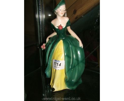 A Goebel figure of a Lady holding flowers