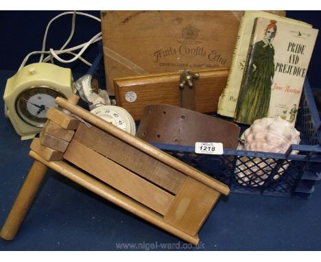 A box of miscellanea including Bakelite clock, shell, timer, football rattle etc.