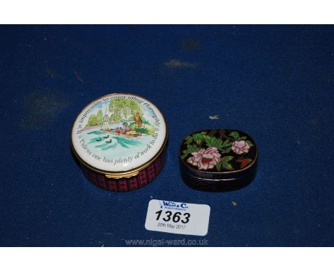A Bilston circular Enamel Box 'Impossible to Enjoy Idling..' together with another Enamel Box in black, blue and gold with fl