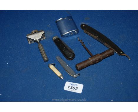 A Lighter, a cut throat Razor, three penknives, Corkscrew and an Ever Ready razor