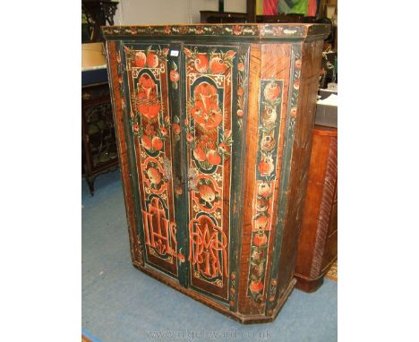 An Interesting late 19th c. Pine Swiss painted two door Cupboard, with upper moulding over the canted corner base with centra