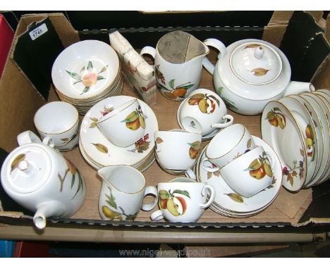 A Royal Worcester Evesham pattern part Tea Service comprising  eight bowls, eleven side plates, ten cups and saucers, teapot,