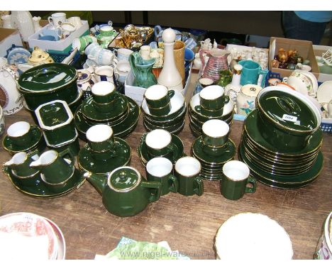 A large quantity of French green and gold part Dinner and Tea Service, approx. seventy pieces