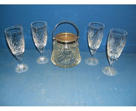 Four boxed Royal Doulton crystal wine glasses and a glass biscuit barrel with white metal lid