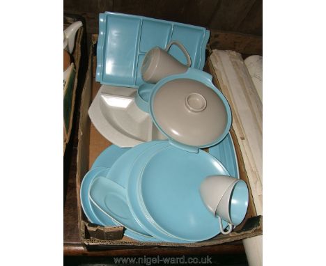 A quantity of Poole Pottery dinnerware being twin-tone in dove grey and sky blue