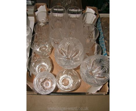 A quantity of cut glasses including Edinburgh Crystal tumblers and other, large Stuart Crystal wine glasses, etc.