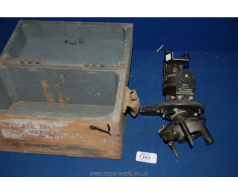 An Astro MKII Compass in a wooden box