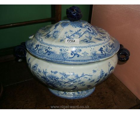 A large Tonquin blue and white Soup Tureen with bird, floral and foliage decoration and rose finial to the lid, the lid a/f.