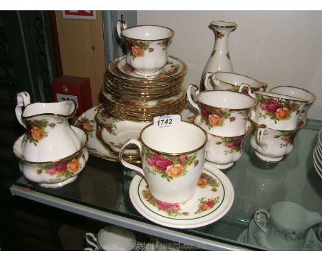 A Royal Albert 'Old Country Roses' part bone china Tea Service including large plate, oval plate, tea for one plate, six tea 